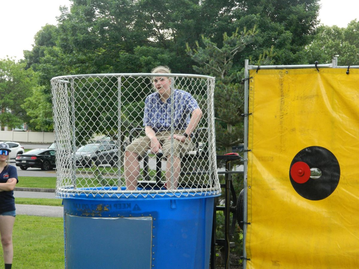Student volunteer for the dunk tank.
