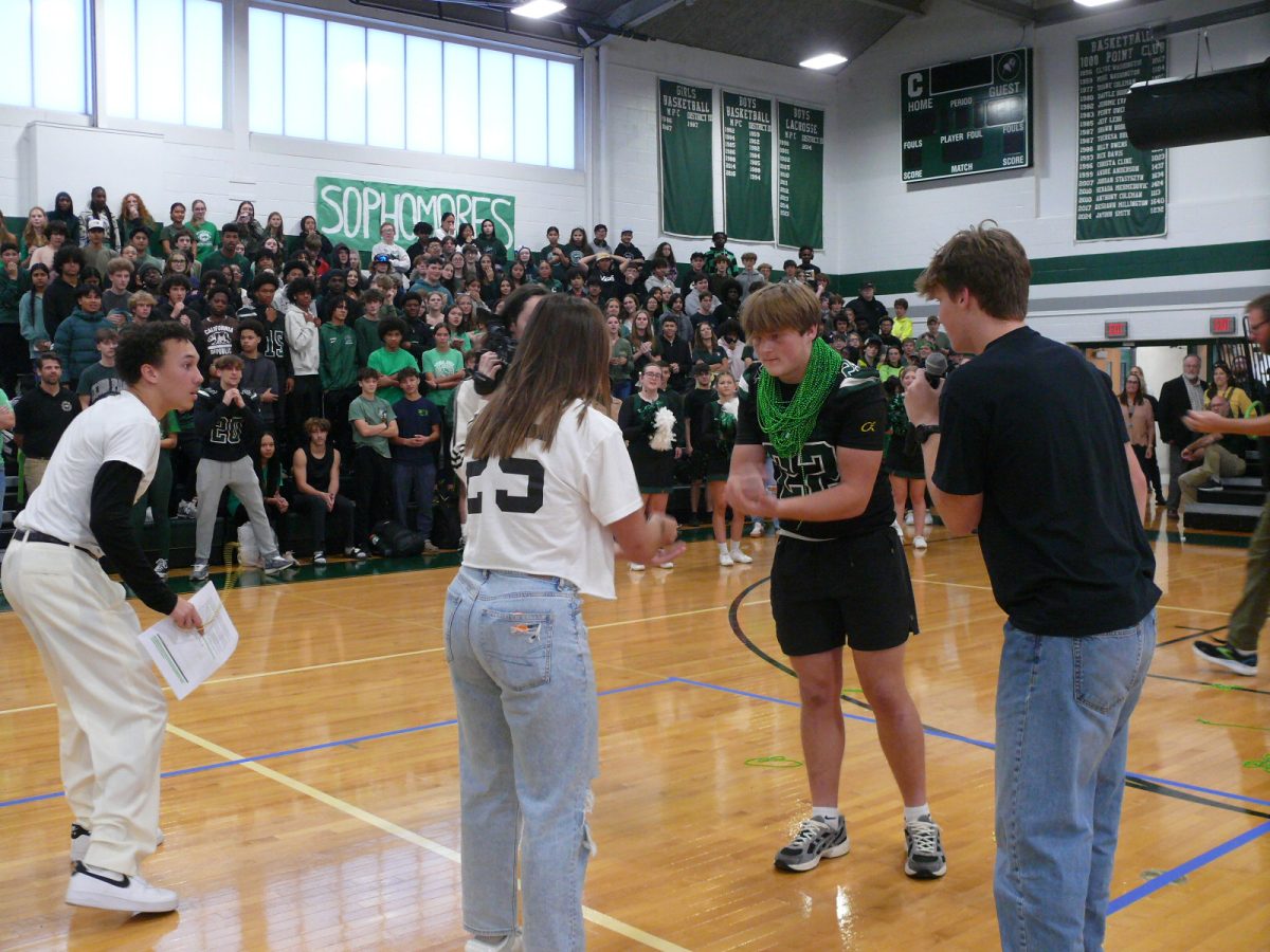 Throughout the week each grade could play rock, paper, scisoors with each other for beads of the grade color. At the pep rally each grade put forward the person with the most beads for a final showdown. Representing the senior class was Ayla Frawley competing against the ultimate winner, sophomore, Josh Smith.